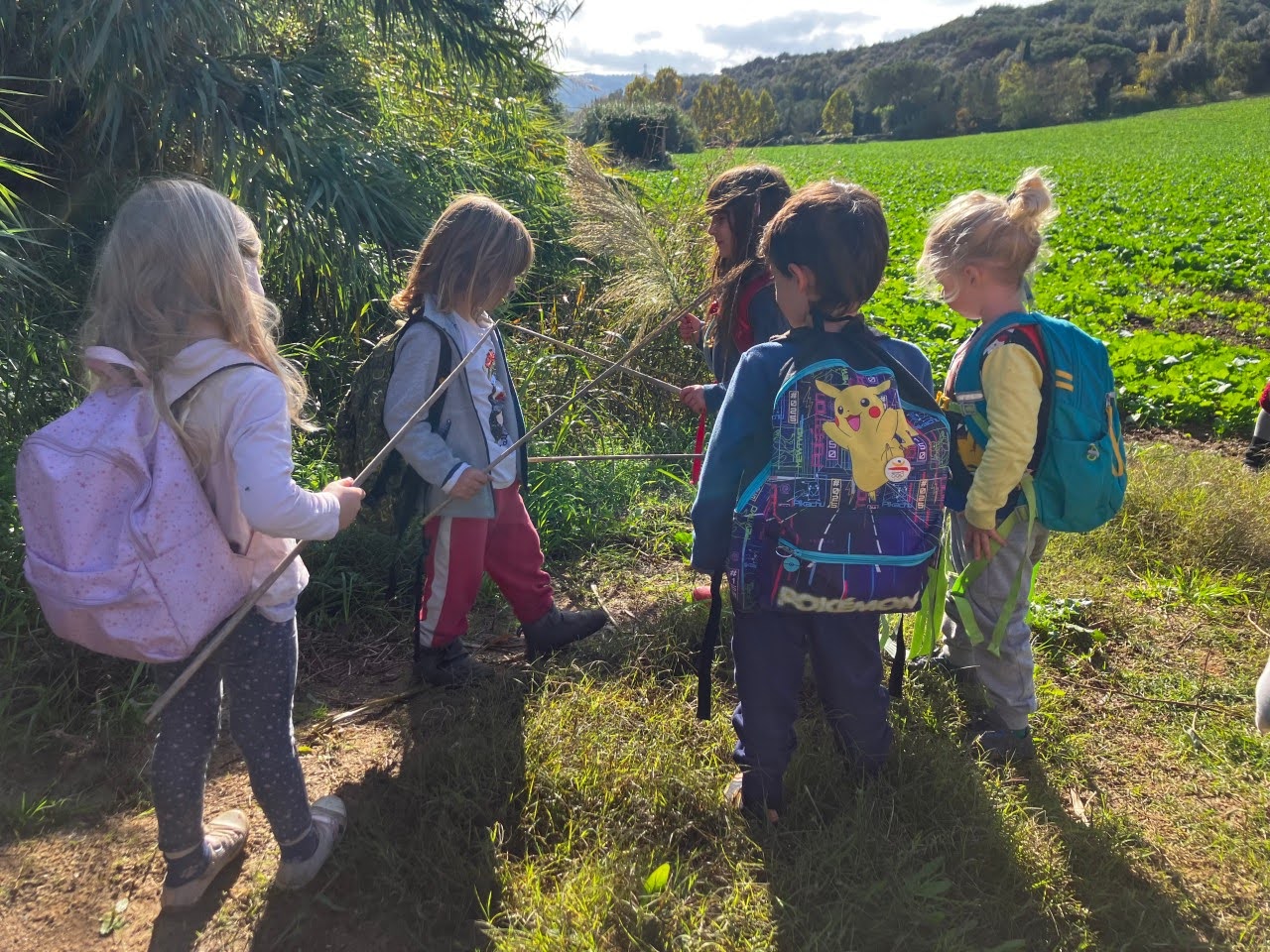 Pre-Kindergarten children playing outdoors